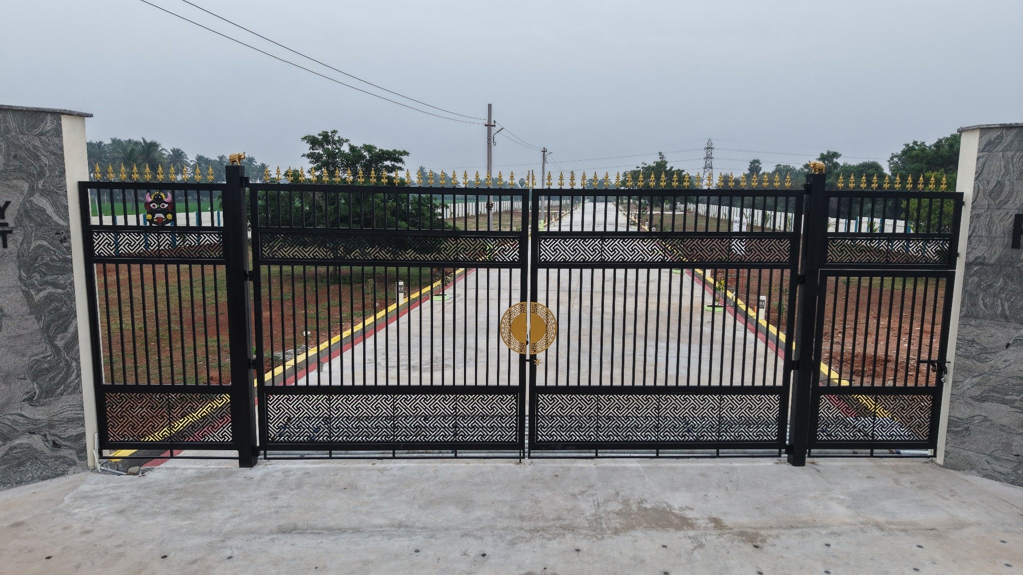 A peaceful, nature-filled entrance experience planned for RK Happy Nest.
